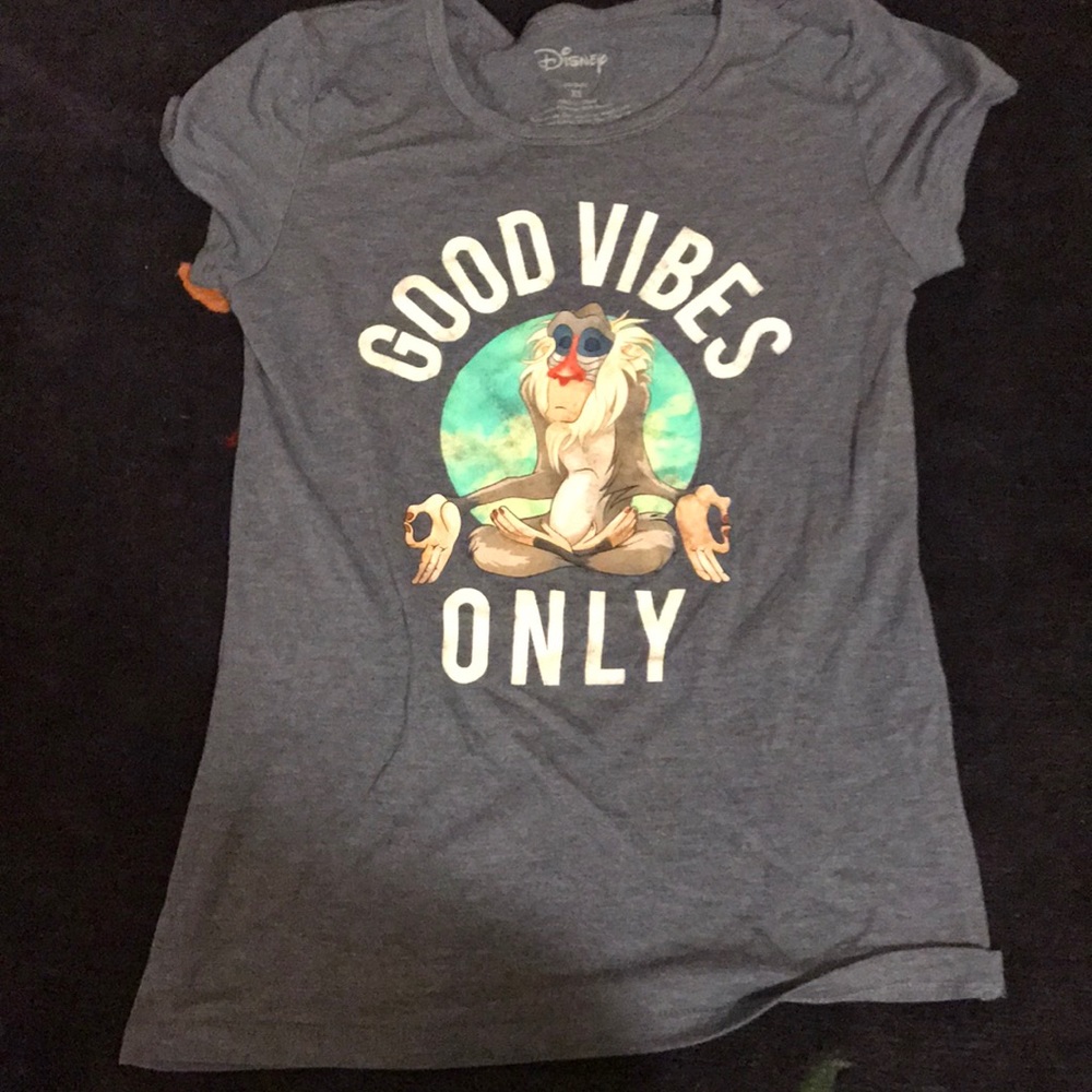 The brand is Disney is size xs and is blueish gray